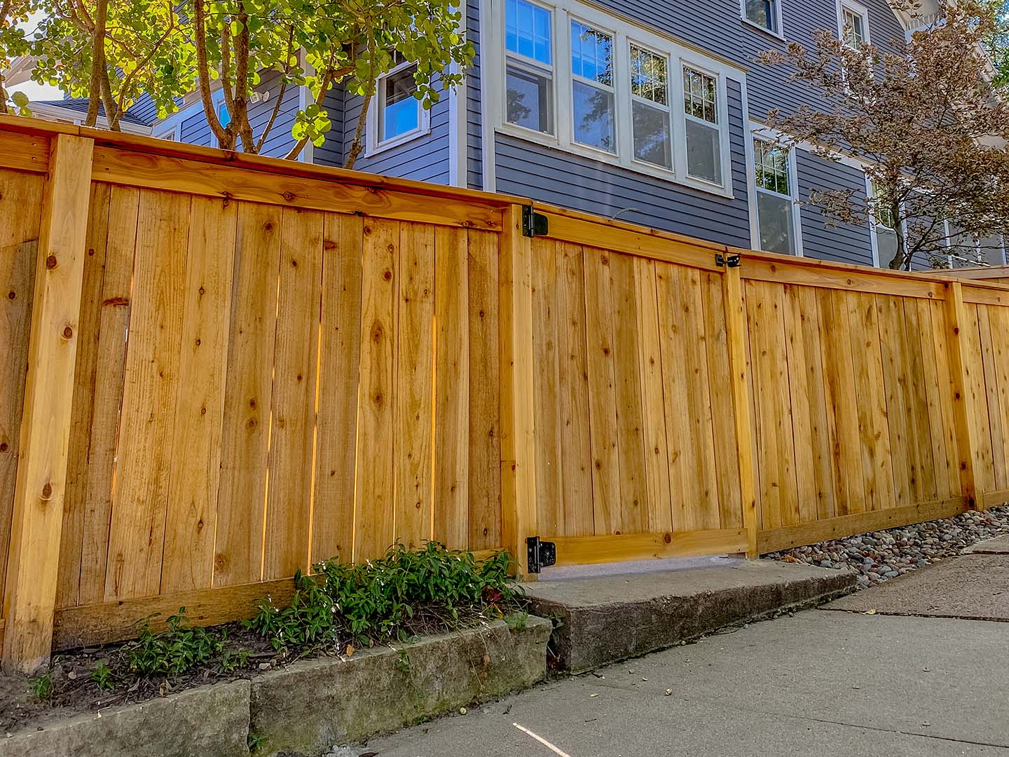 Photo of stained wood privacy fence in Cedar Falls, Iowa